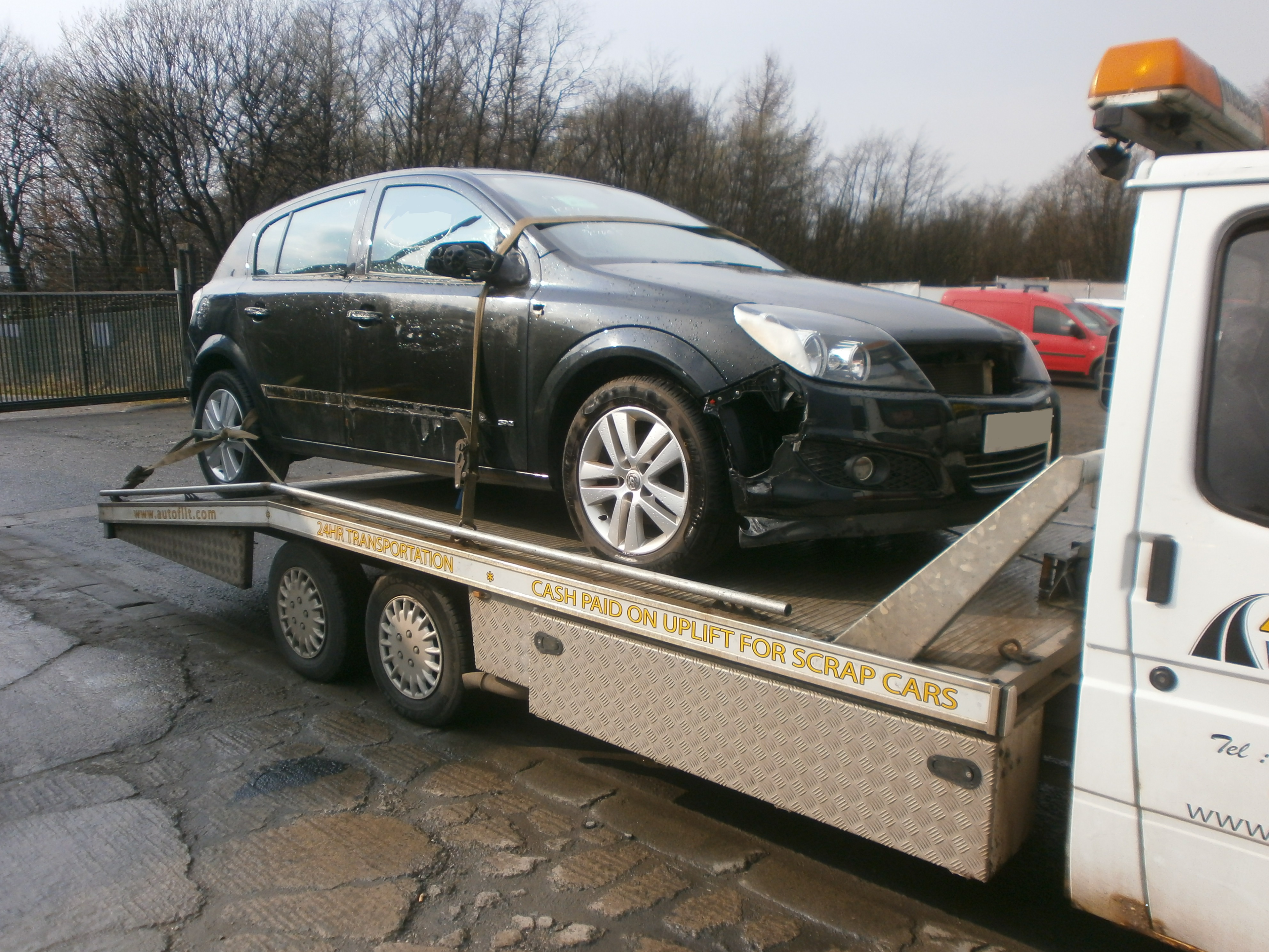 Scrap Vauxhall Corsa on the back of the Autoflit transporter